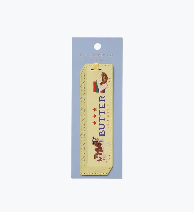 RIFLE PAPER CO. Butter Stick with It Bookmark, 1.75" W x 6" L, Playful Butter Stick with It Text, Wipe-Clean Saffiano Polyurethane, Grosgrain Ribbon, Gold Foil Logo