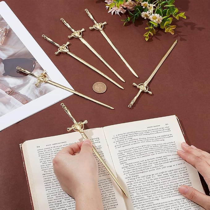 UNICRAFTALE 6Pcs Sword Bookmarks Sword Hair Pin Vintage Golden Metal Pendant Bookmarks Hair Pins Sticks Ancient Large Sword Bookmark Charms for Book Lovers Presents Reading Crafting Gifts